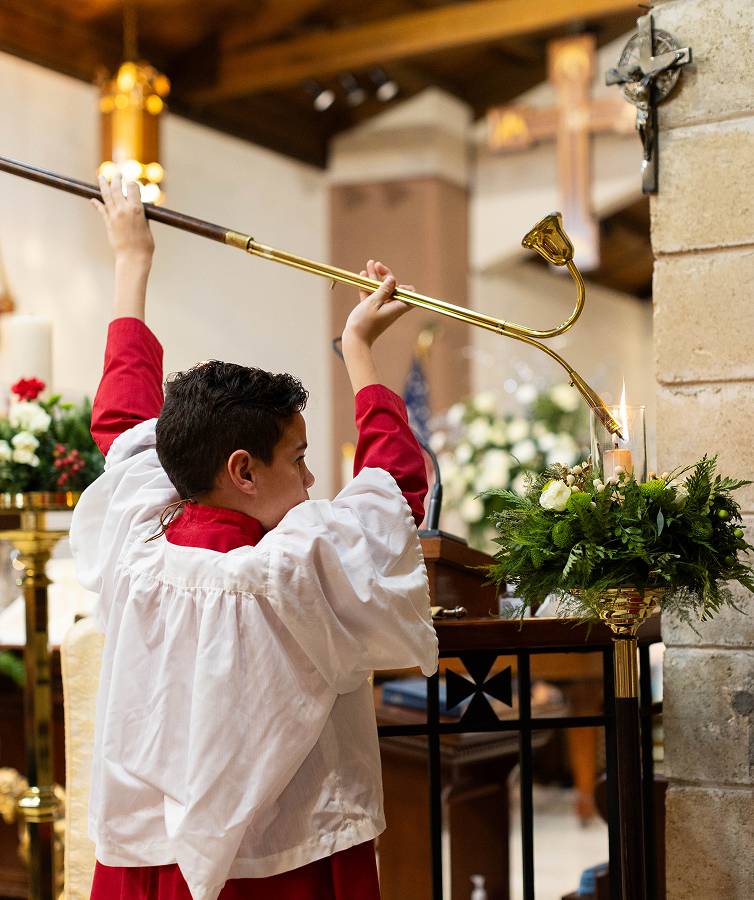 Child lighting a candle