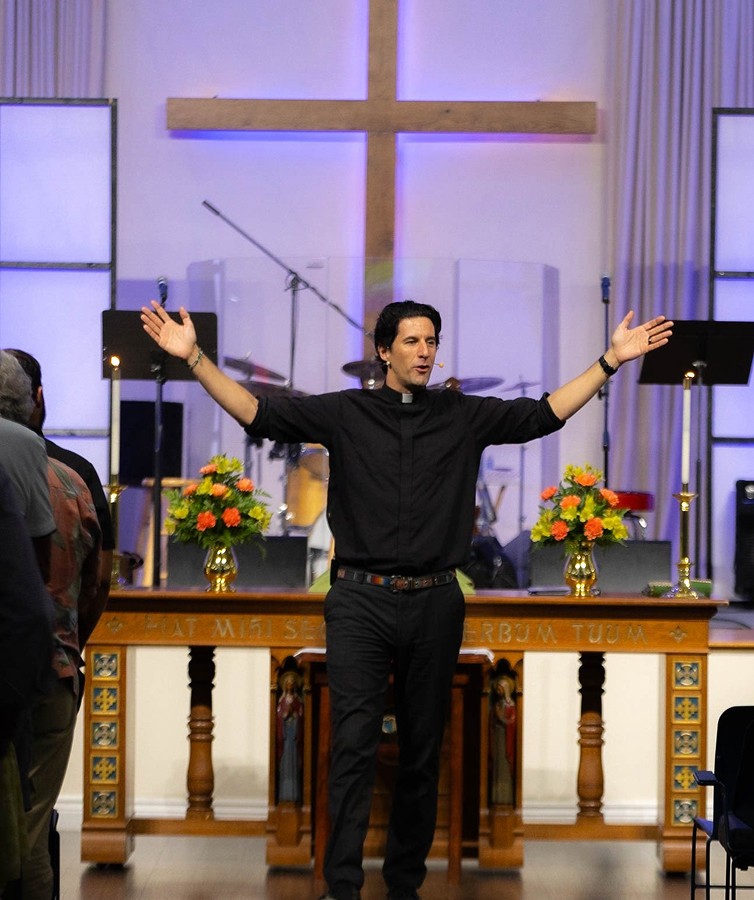 Pastor leading service