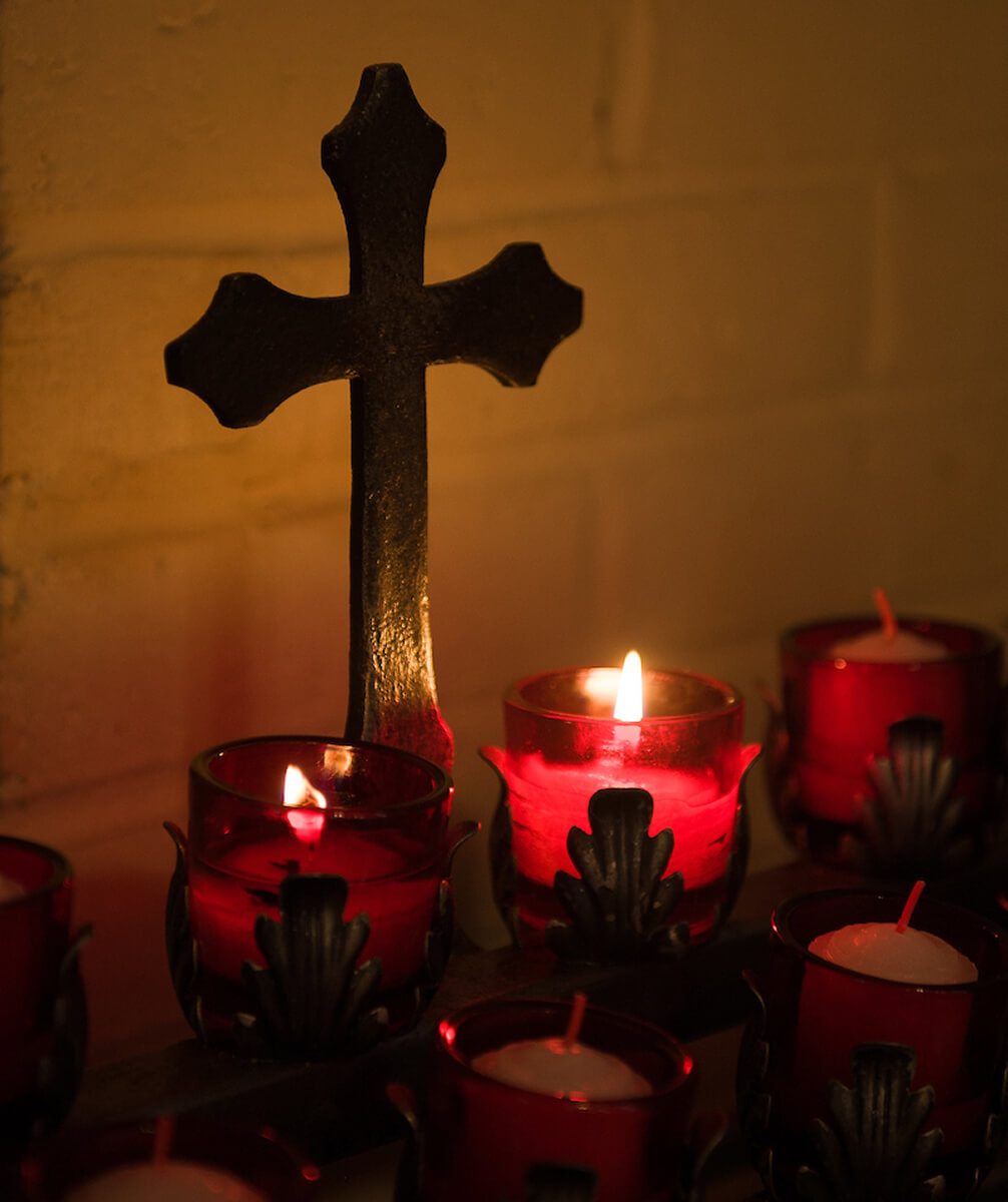 Cross & Red Candles
